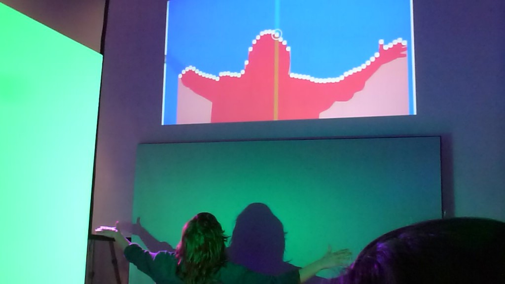 A person interactiing with sound of shadows